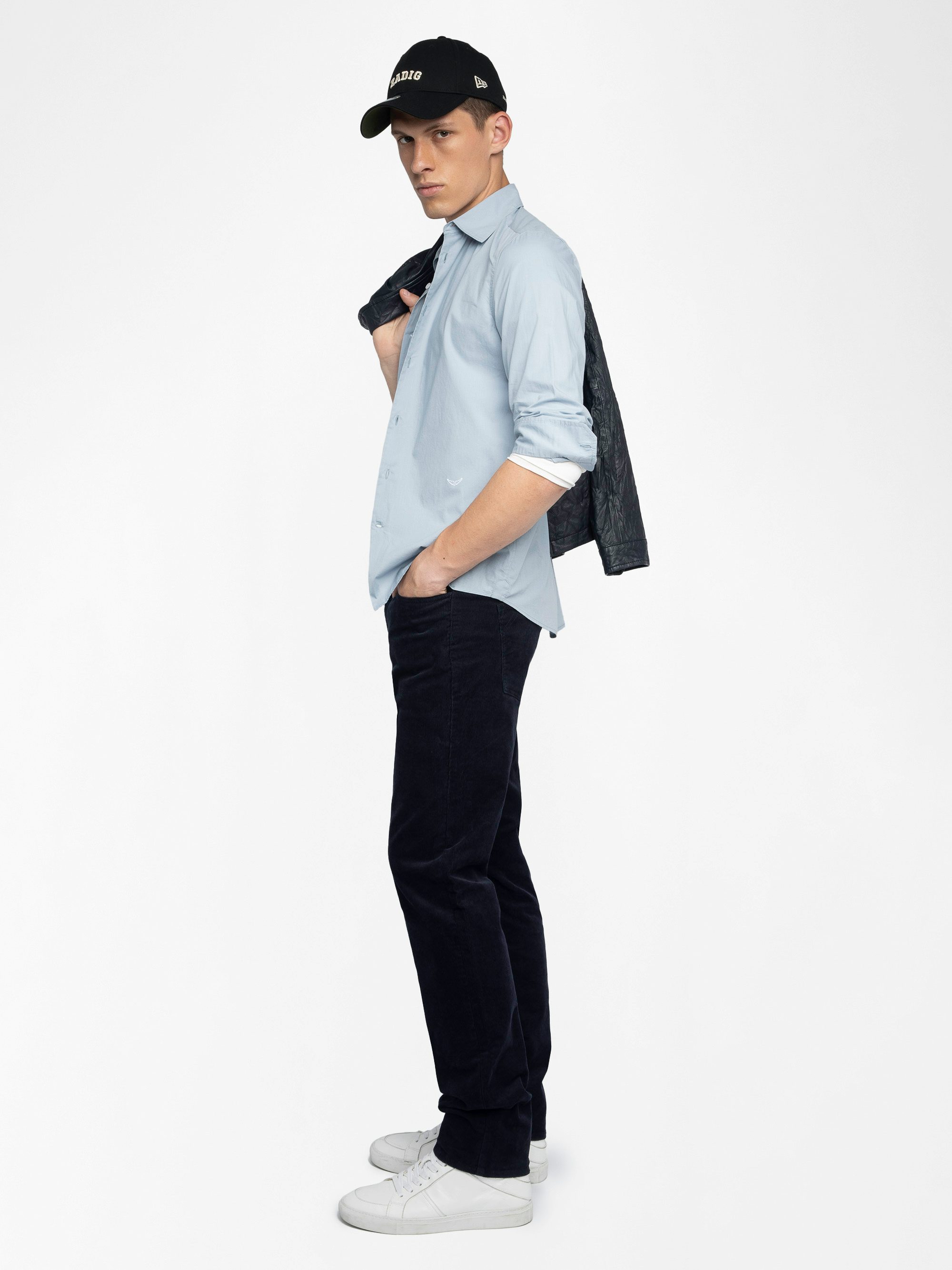 Steeve Corduroy Trousers - Corduroy trousers with button opening.